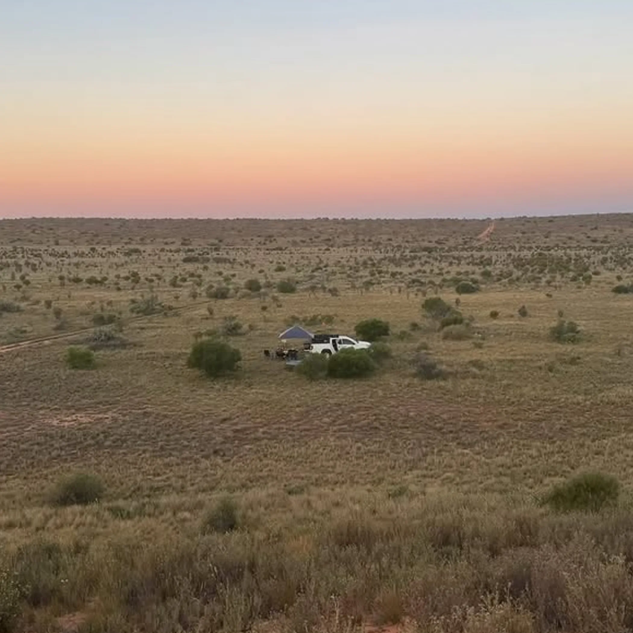 outback vehicle and campsite scene