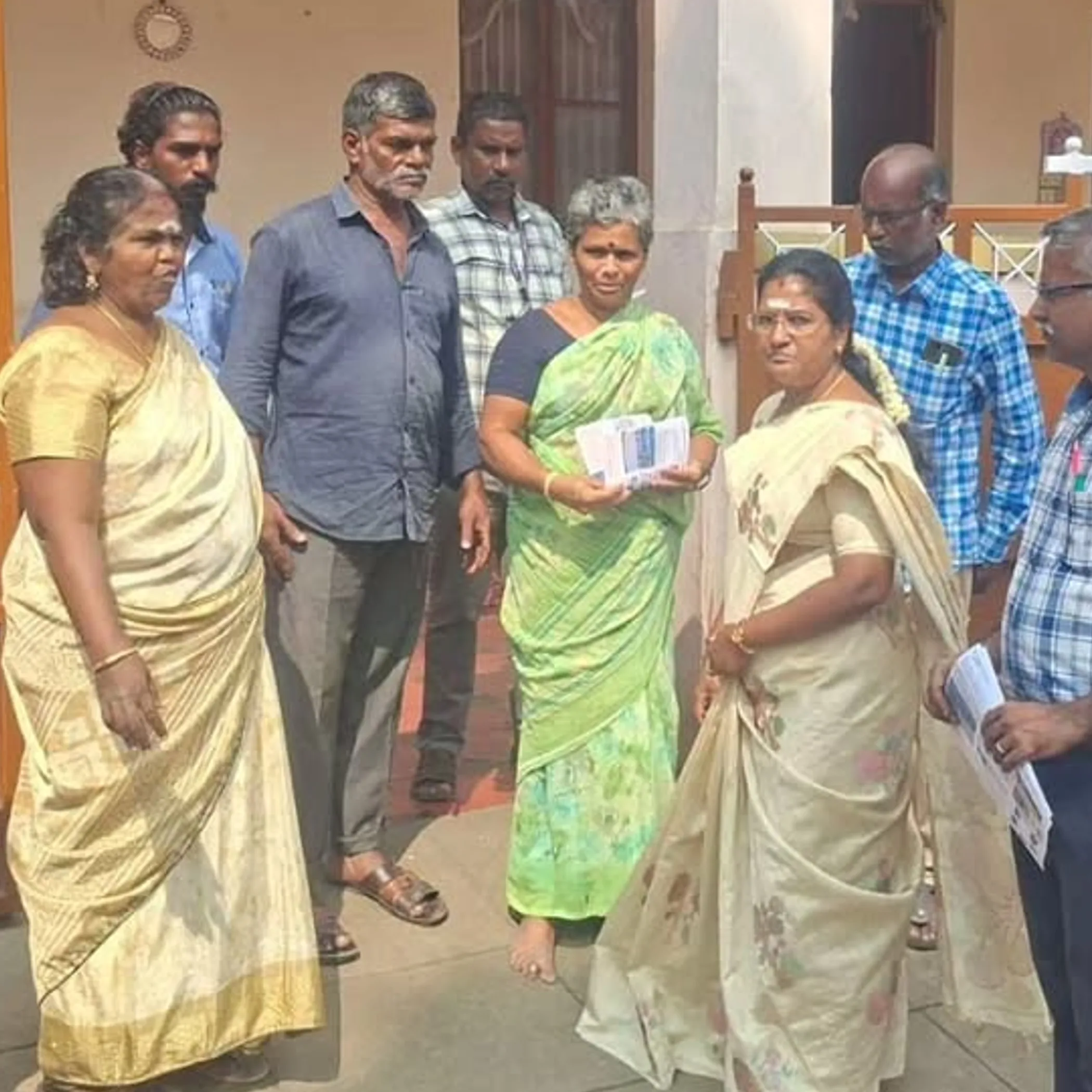 officials distributing rainwater conservation materials